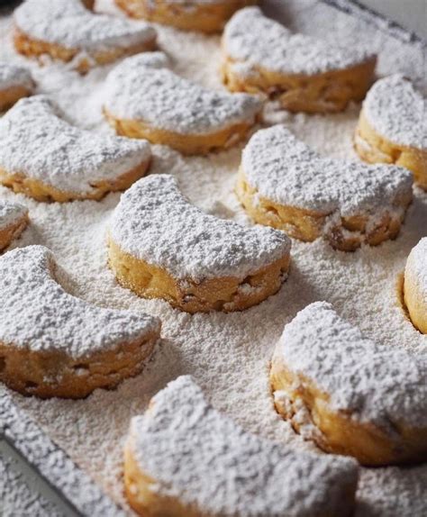 Kourambiethes — Greek butter cookies dusted with powdered sugar